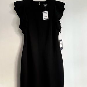 NWT cocktail dress. Black. With fringe design. Size 6